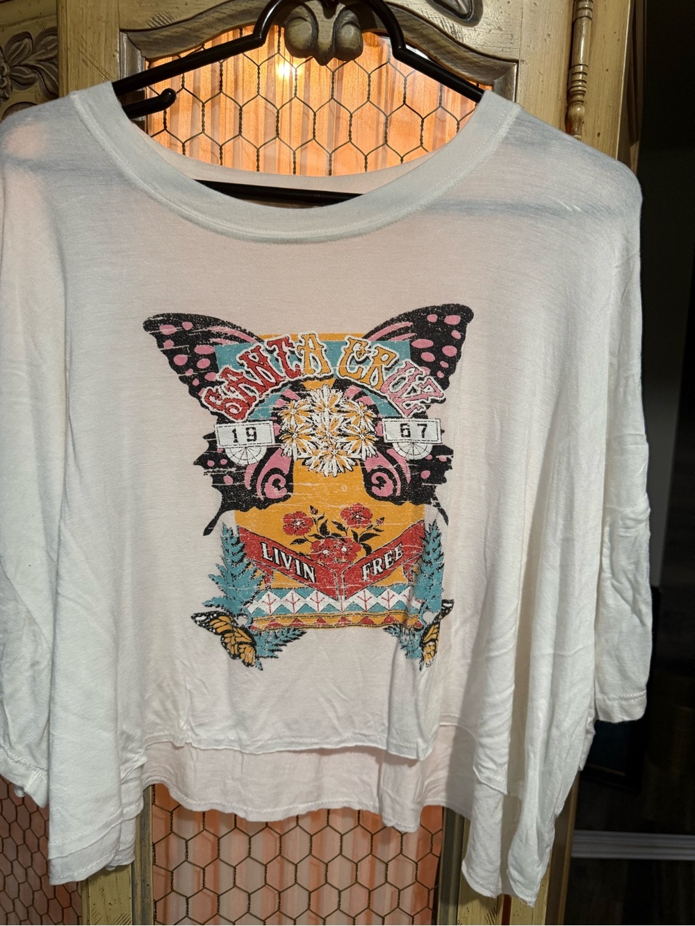 Santa Cruz Skateboards White Graphic Tee with Multicolor Butterfly Motif